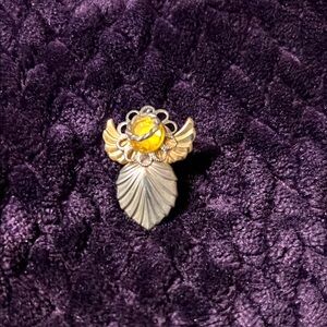 Elegant Gold and Silver Angel Brooch yellow gem stone